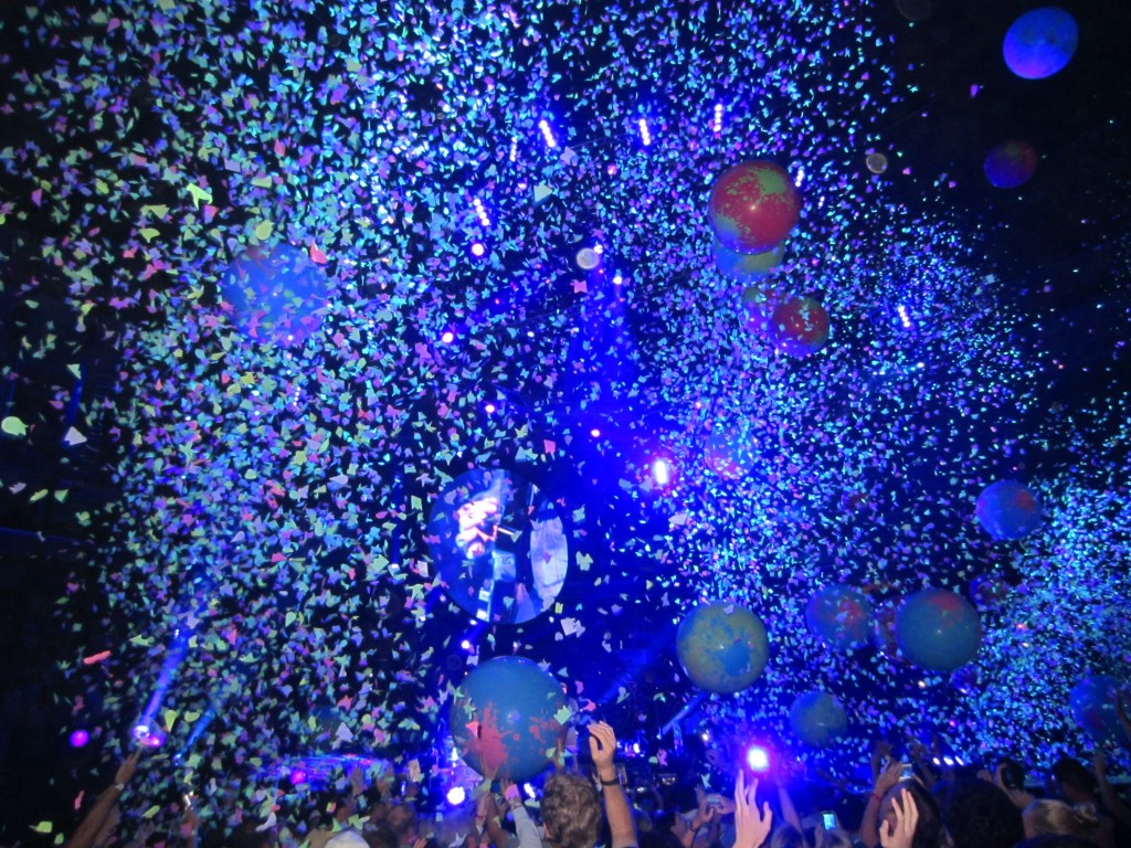 confetti flying in the air at a concert