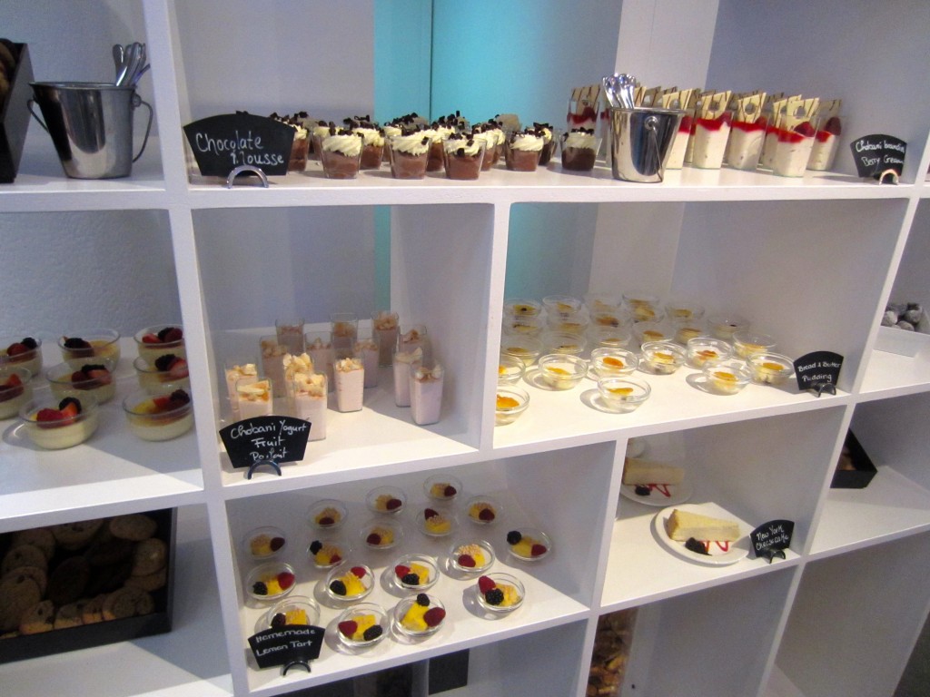 a shelf with desserts on it