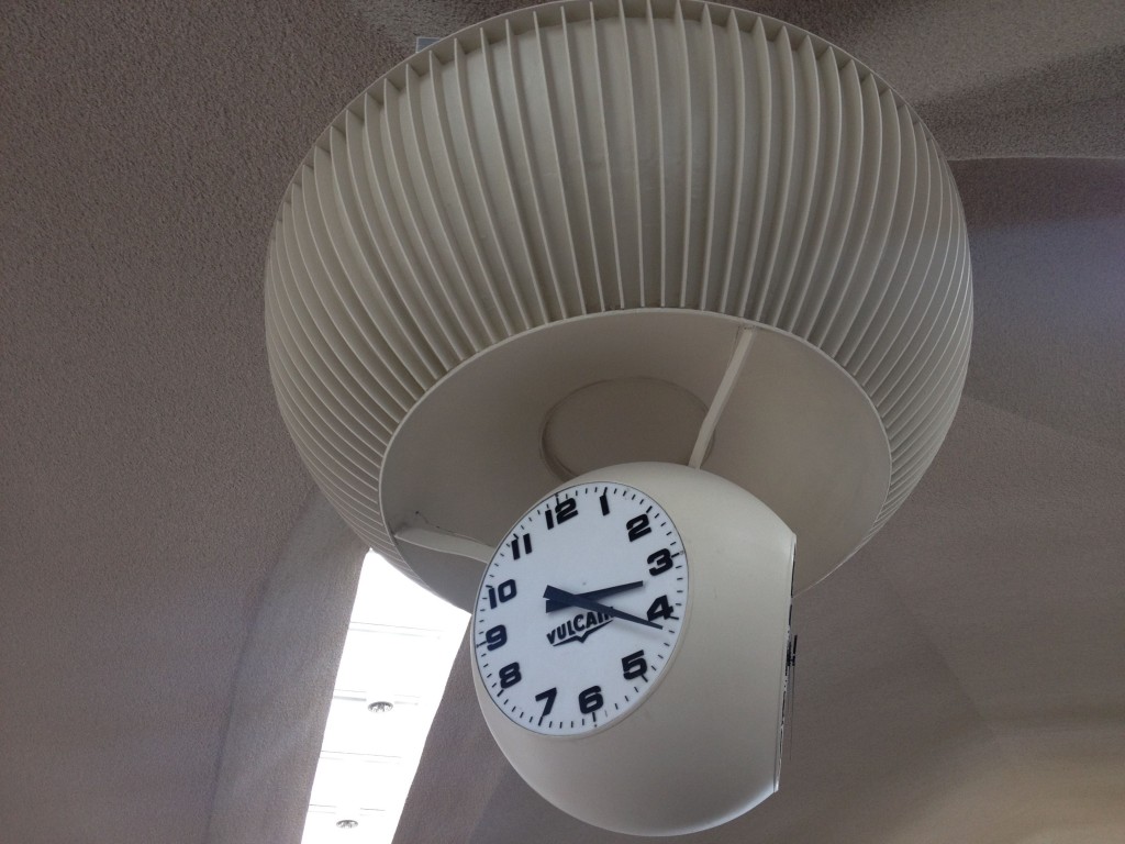 a clock from a ceiling