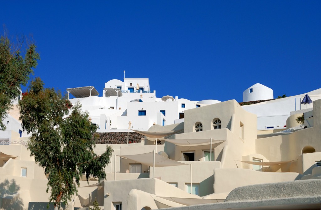 a white buildings with blue sky