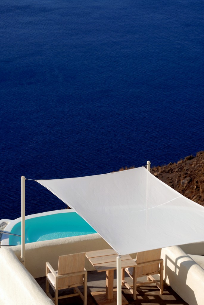 a white awning over a pool