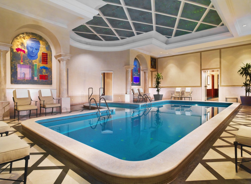 a indoor pool with a large pool