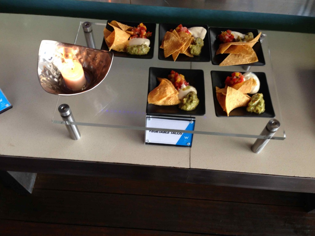 a plate of food on a glass table