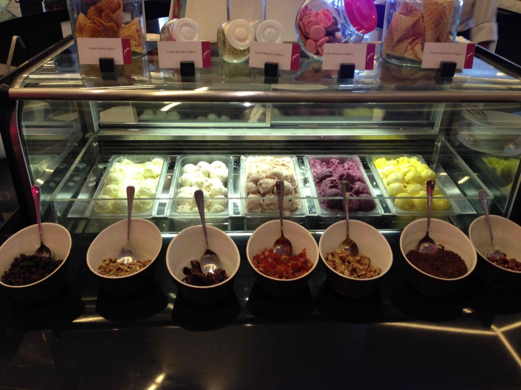 a display case with different types of ice cream