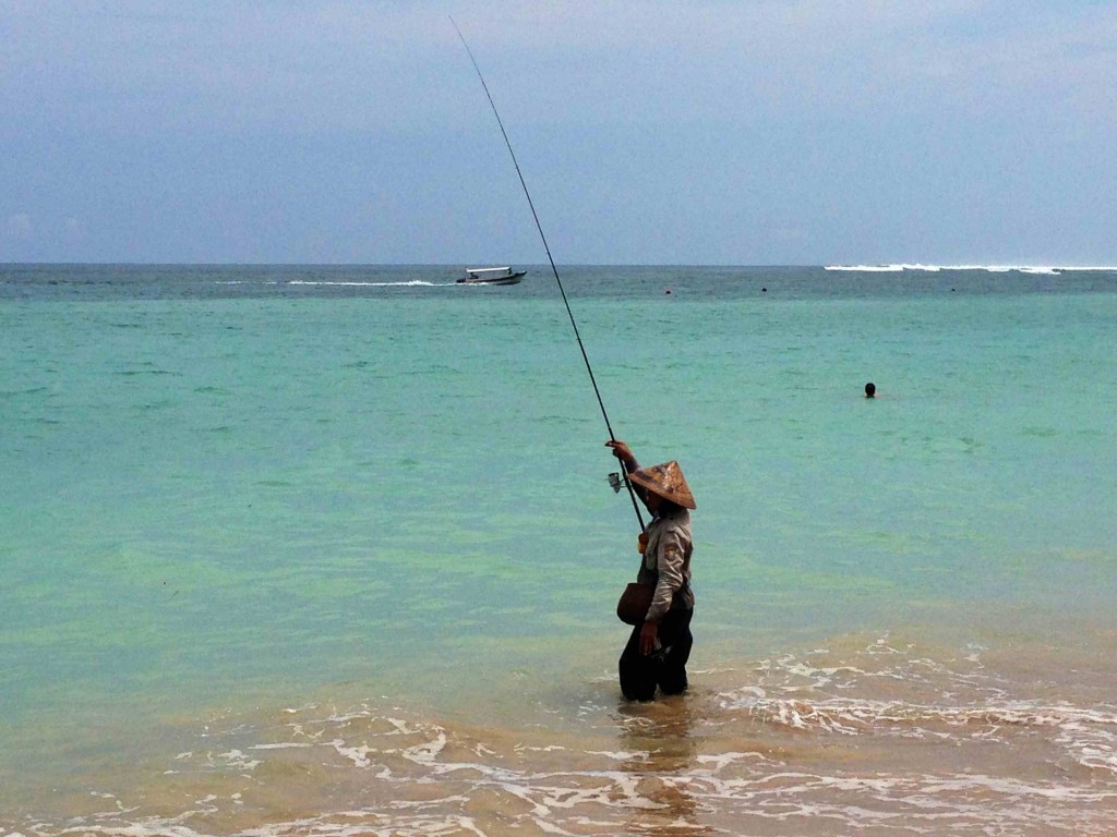 a person fishing in the water