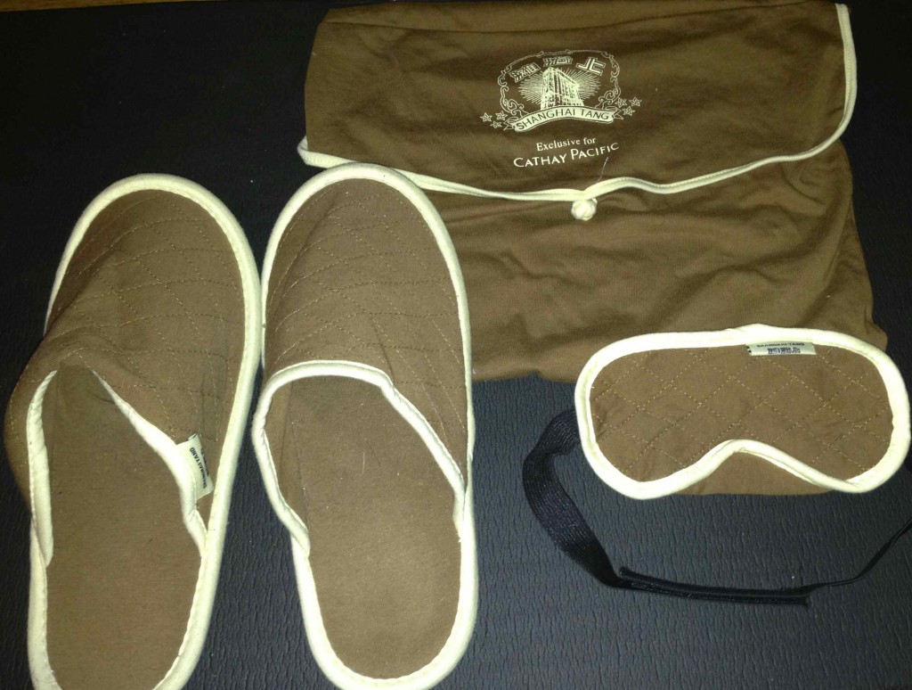 a pair of slippers and a sleeping bag