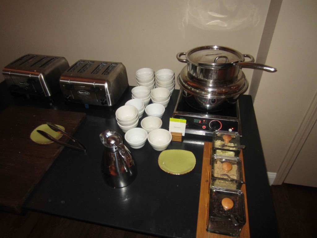 a kitchen counter with a pot and bowls on it