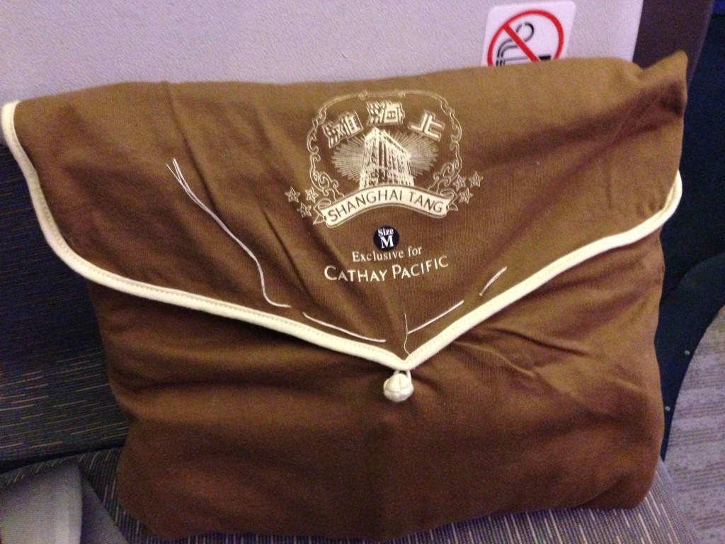 a brown bag with a white zipper