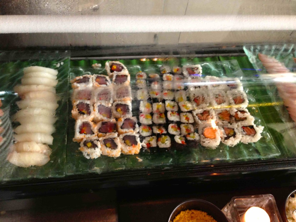 a tray of sushi on a table
