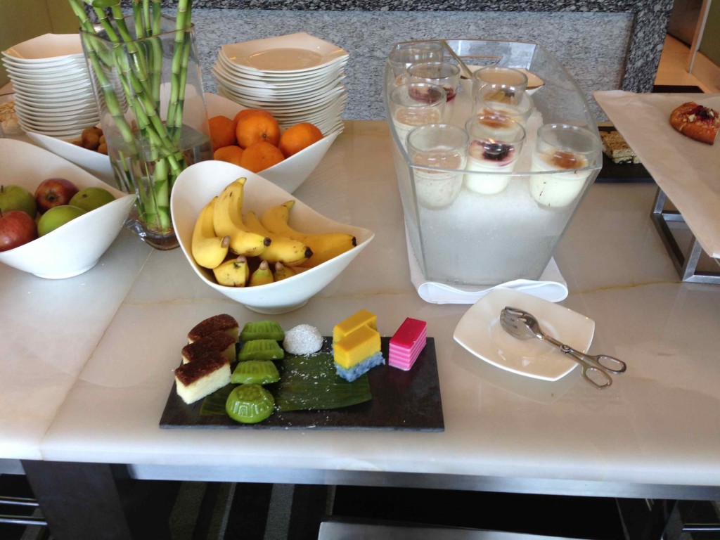 a table with plates and fruit on it