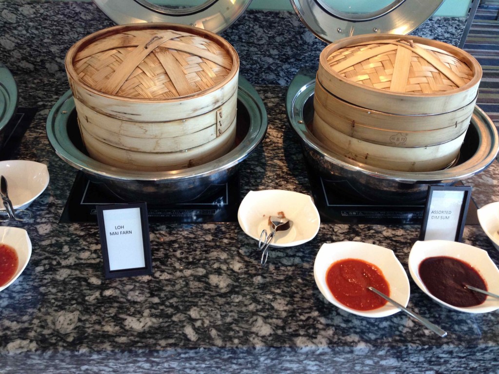 a group of baskets in bowls with sauces