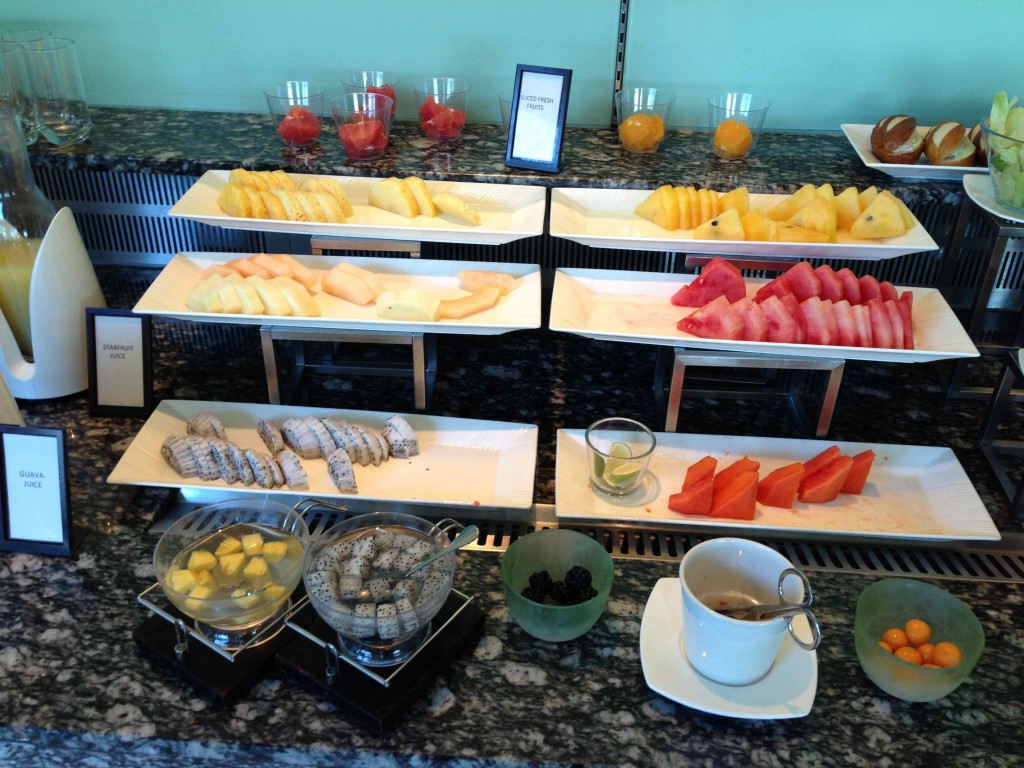 a buffet table full of different types of fruit