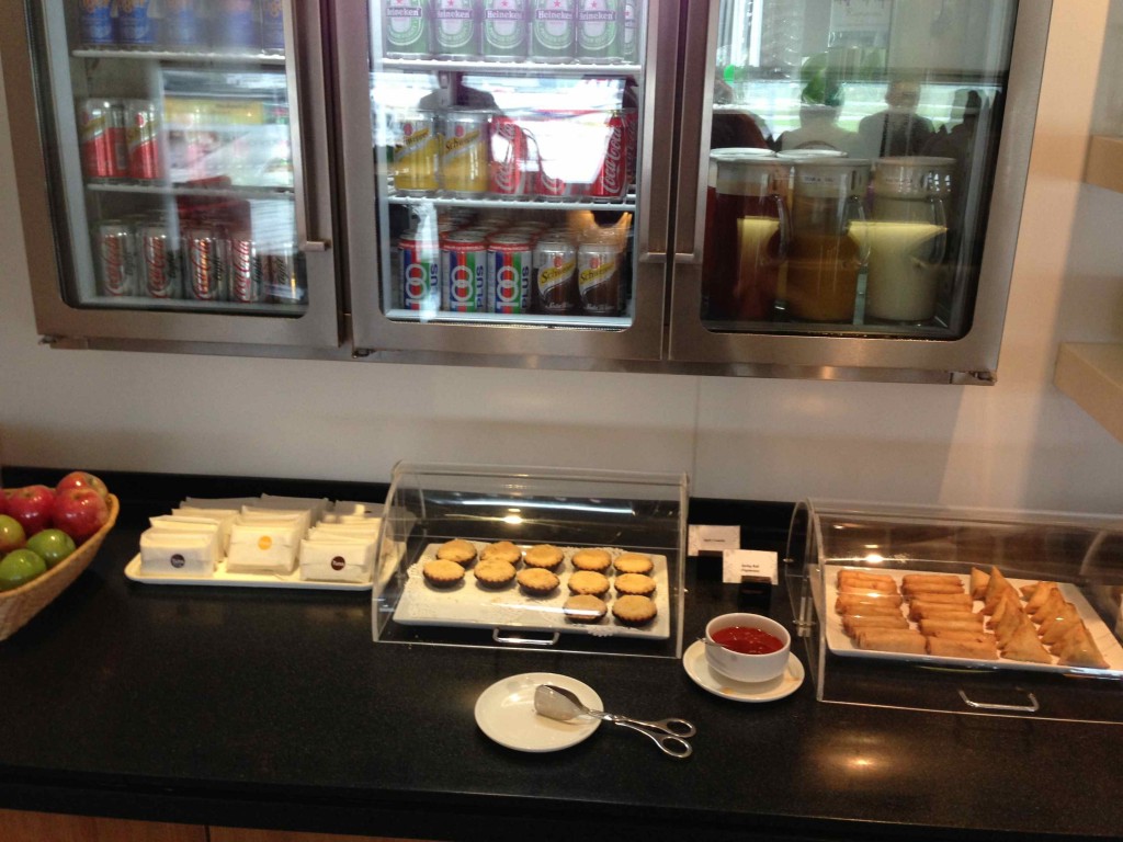 food in a buffet with drinks and snacks