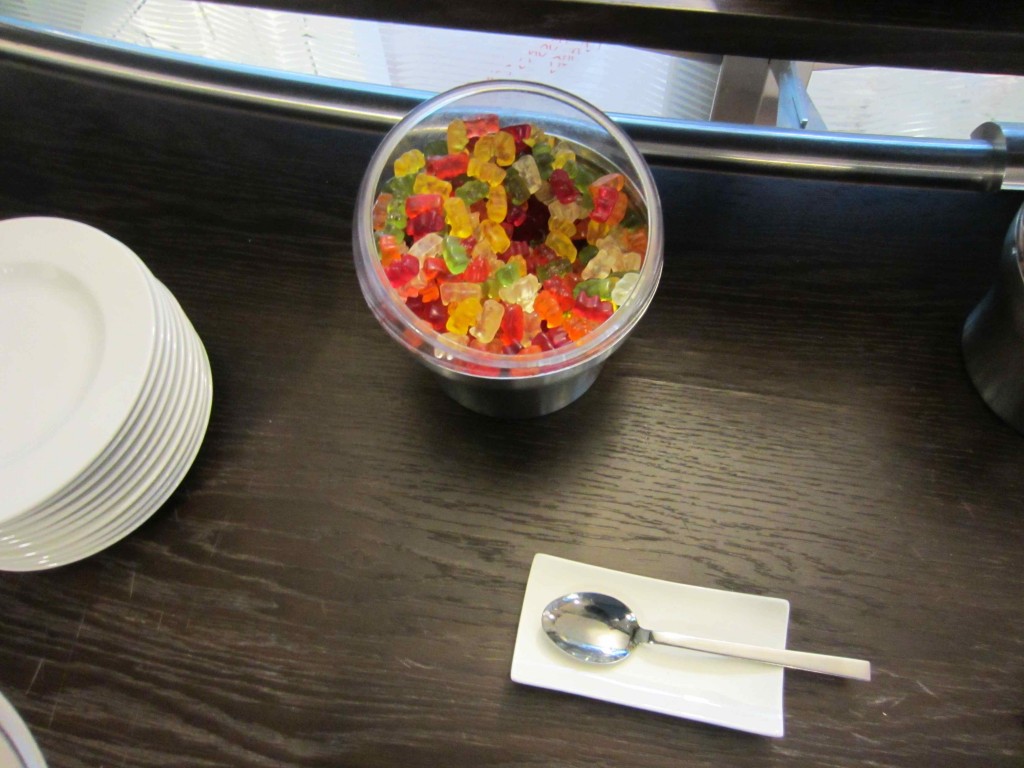 a bowl of gummy bears on a table