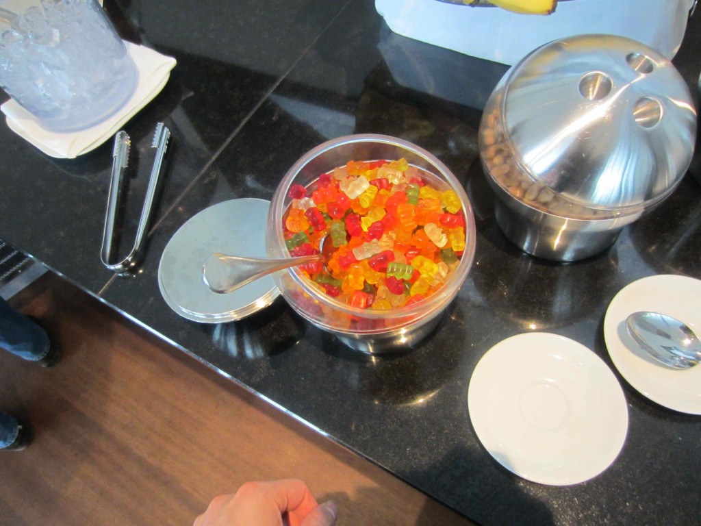 a bowl of gummy bears on a table