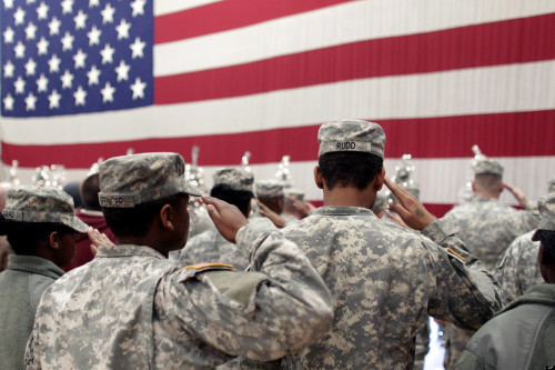 a group of soldiers saluting