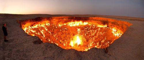 The Door to Hell, a burning natural gas field in Derweze, Turkmenistan. Photo by Tomrod Sandtorv and Hellbus. Used with permission.