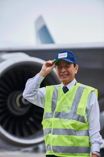 Engineer Higashi Ihoto wears his old uniform cap with a huge sense of pride. Photo by Cathay Pacific.