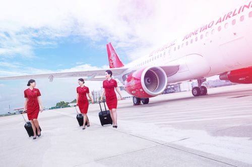 Juneyao Airlines' flight attendants. Photo from Star Alliance.