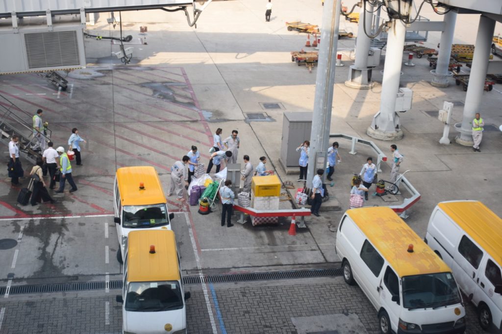 Cathay Pacific cleaning crew at Hong Kong International Airport (HKG). Photo by the author.