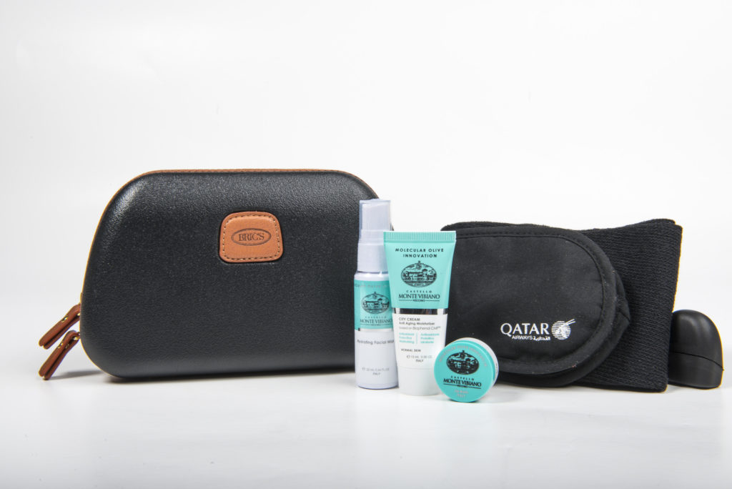 Qatar Airways' new Business Class Mens amenity kit by BRICS, with Castello Monte Vibiano Vecchio products. Flickr/Qatar