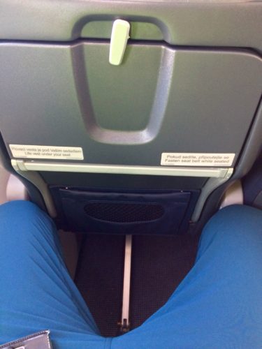 a person's legs in blue pants