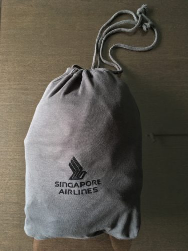 a grey bag with a logo on it