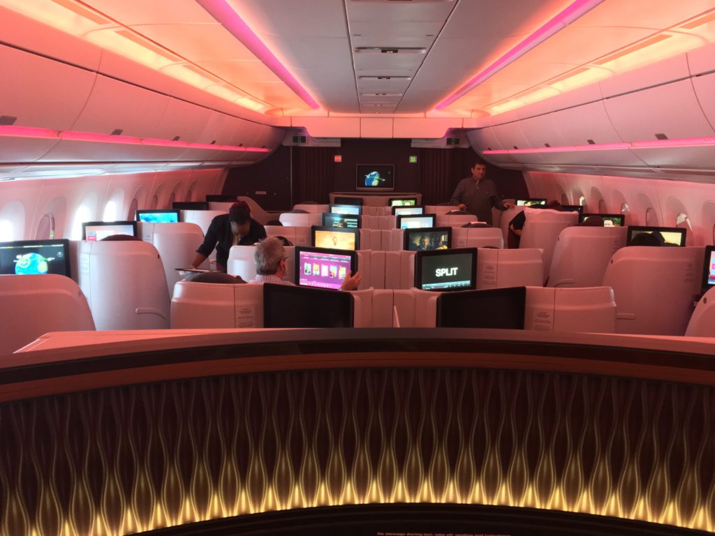people in an airplane with computers