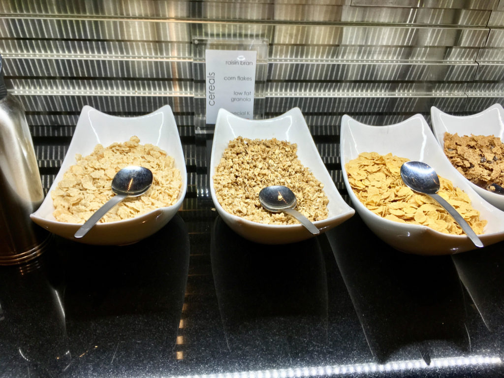 a row of bowls of cereal