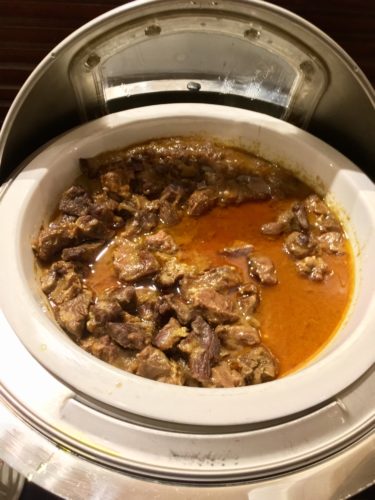 a bowl of food in a cooker