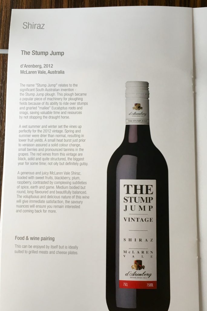 a magazine with a bottle of wine