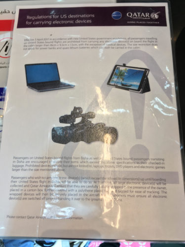 a paper with a picture of a laptop and a camera