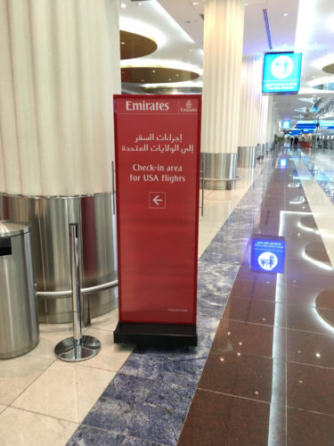 a red sign in a airport