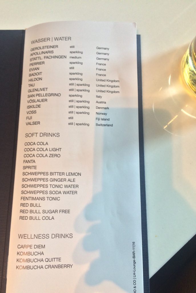 a menu with a drink on it