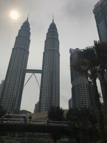 a tall buildings with a bridge