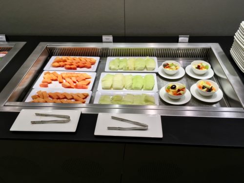 a tray of fruit and vegetables on a counter