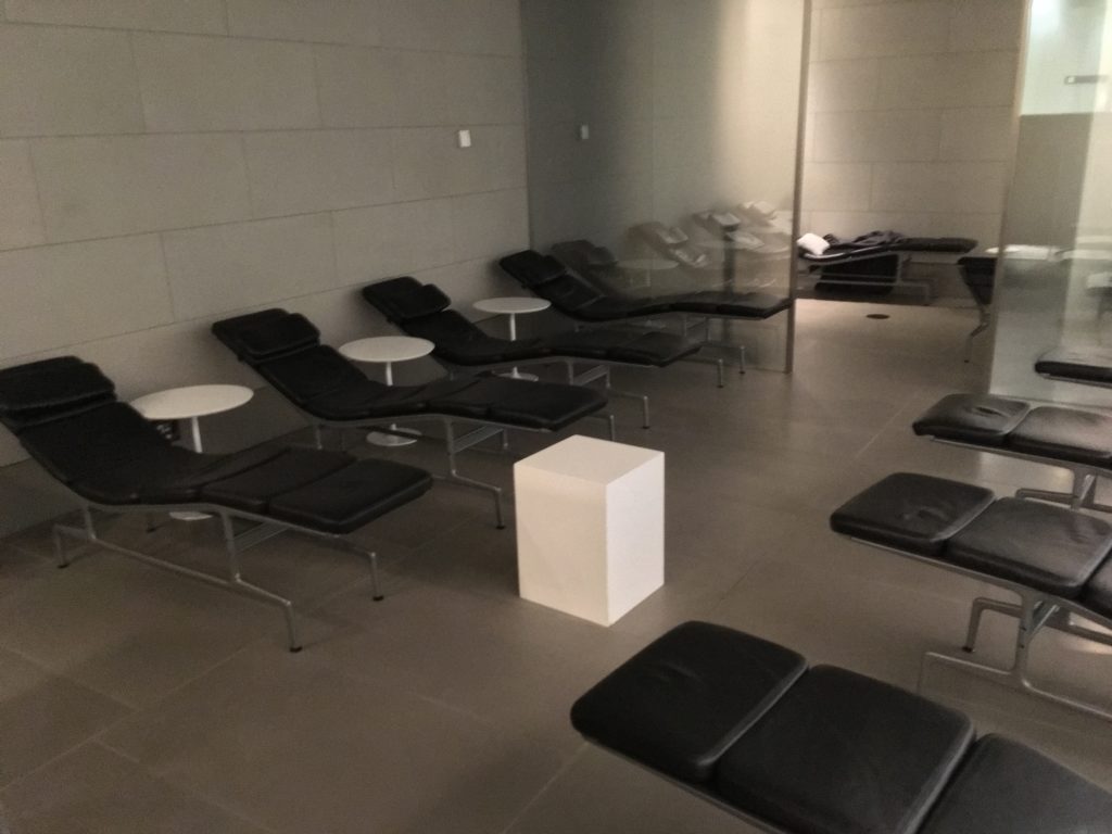 a room with chairs and tables