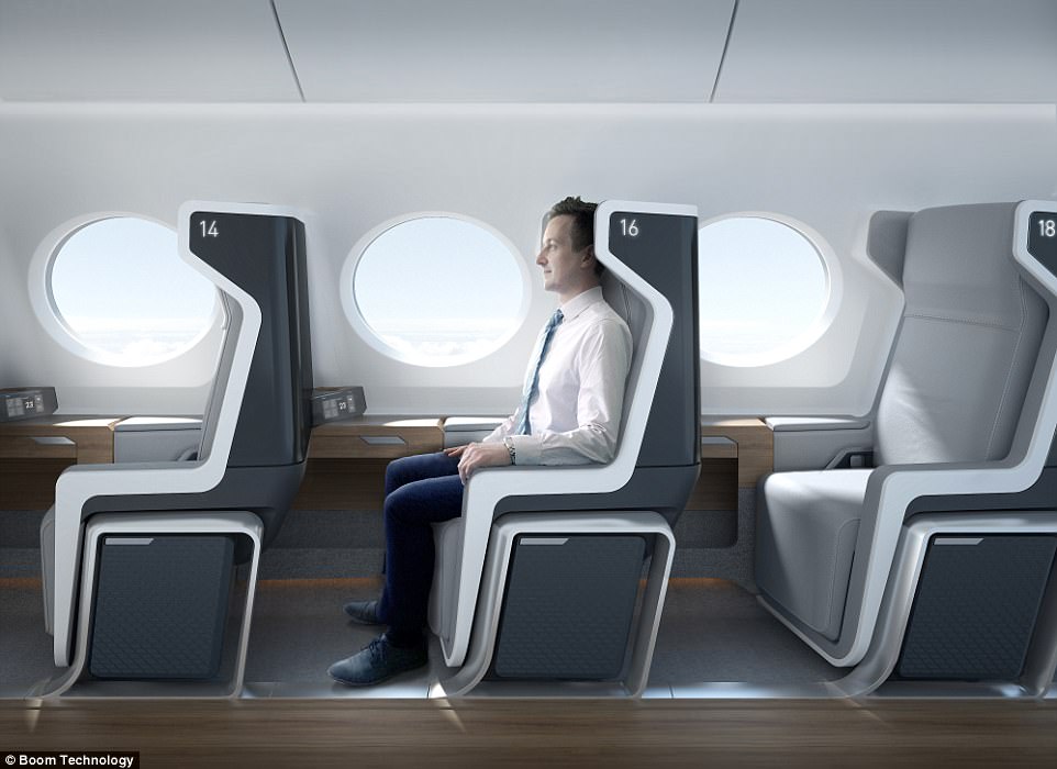 a man sitting in a chair in a plane
