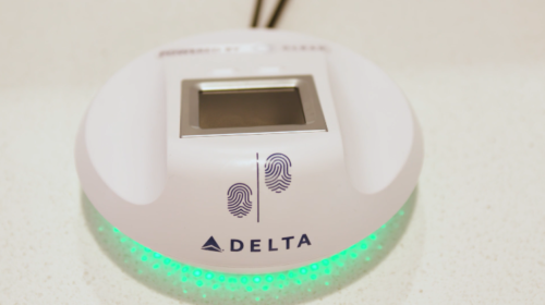 a fingerprint scanner on a white surface