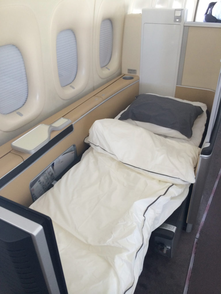 Lufthansa First Class bed onboard the Boeing 747. Photo by the author.