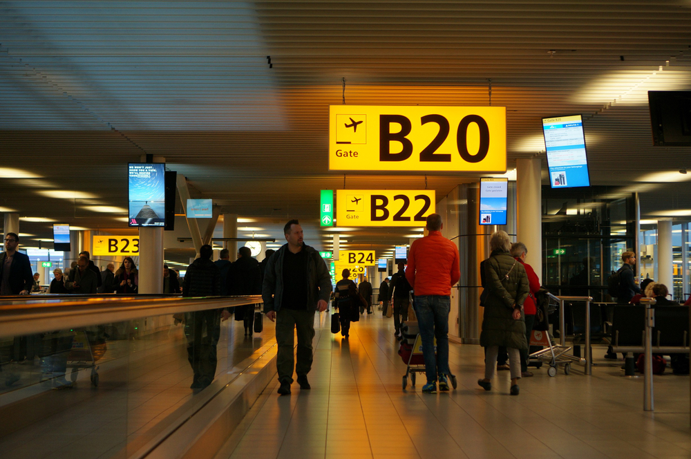 Gate signage at Schiphol Airport is well-lit and easy to find.