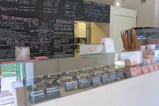 a display case with plates and menus