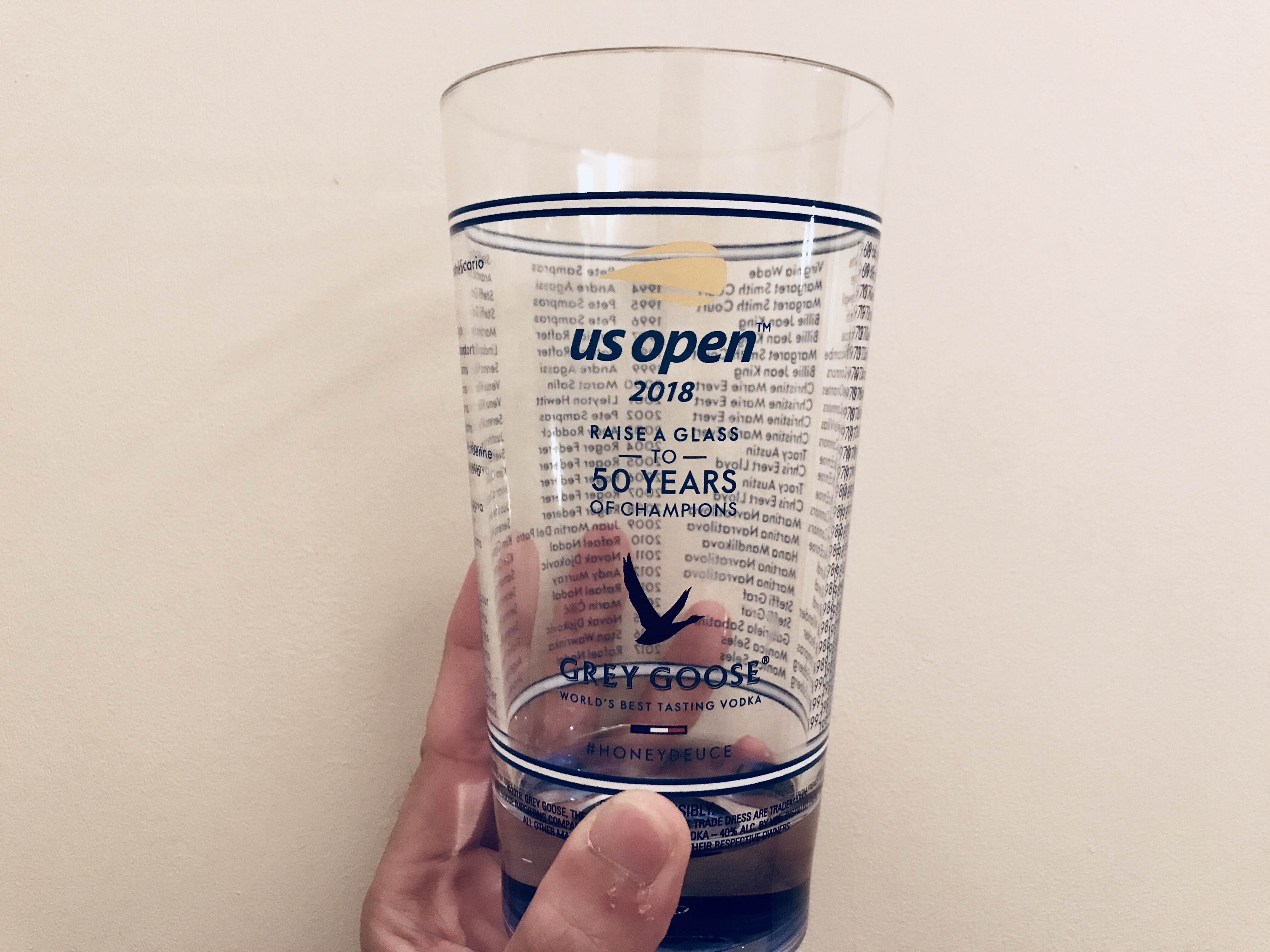 An empty U.S. Open souvenir "glass." (It's actually hard plastic.) Image by Chris Dong
