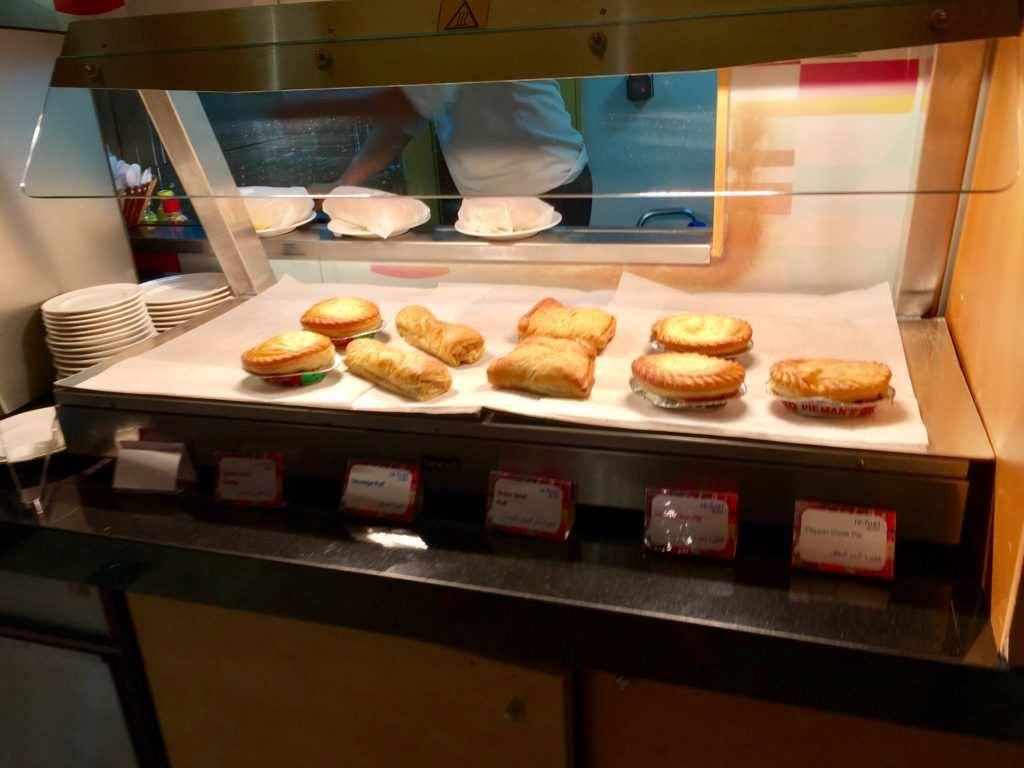 a display case with pastries on it