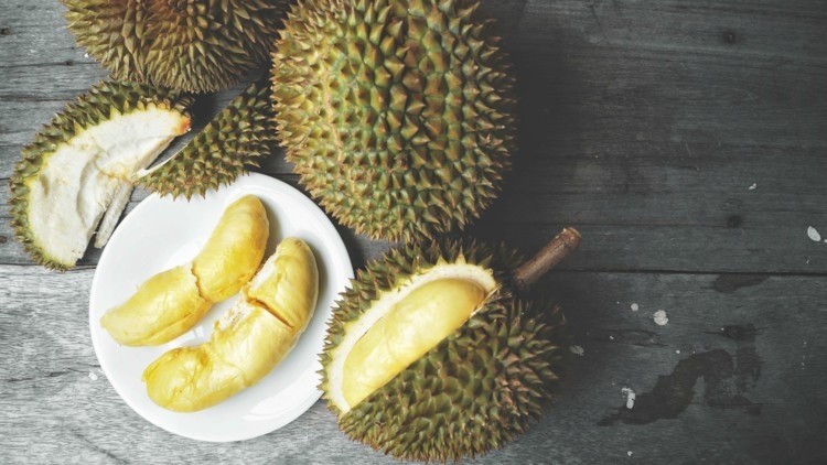 a plate of durian on a table