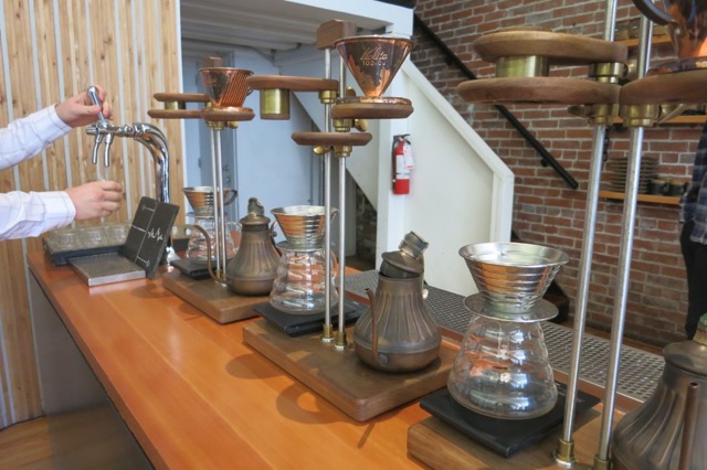 a group of coffee maker on a counter