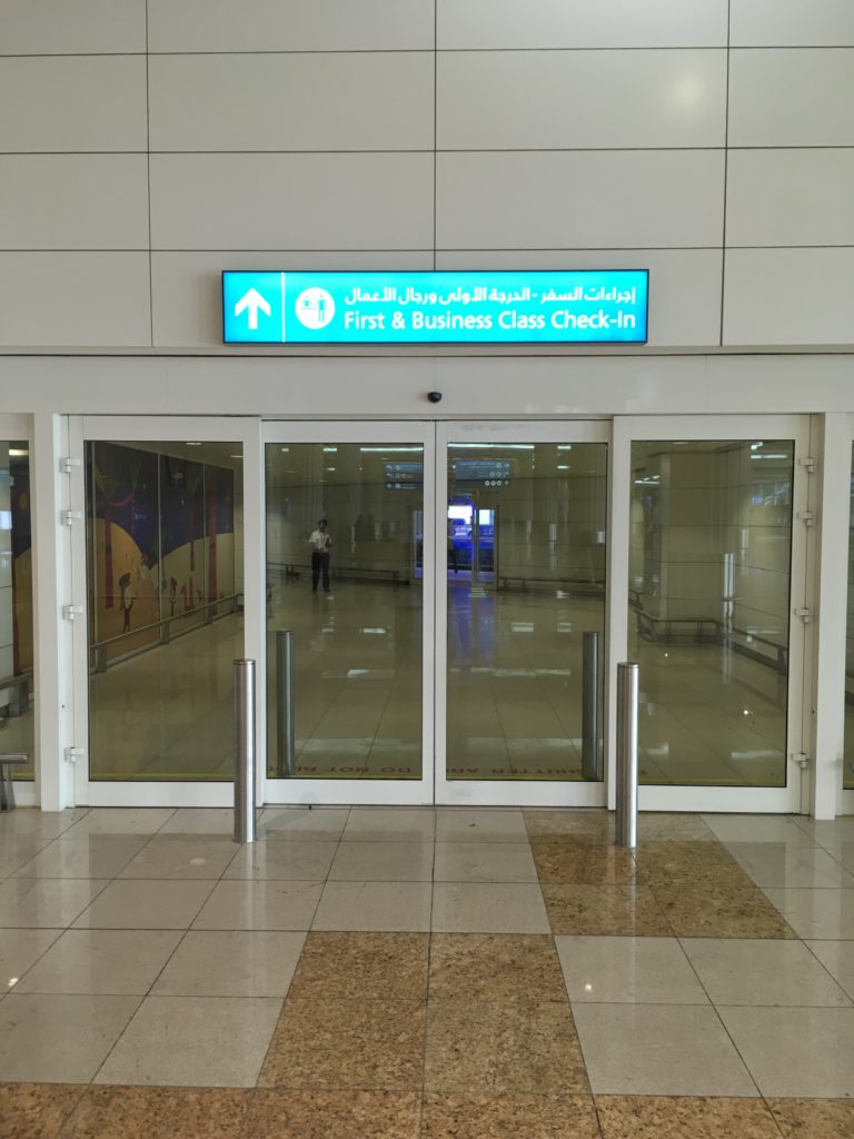 a glass doors with a sign on the front
