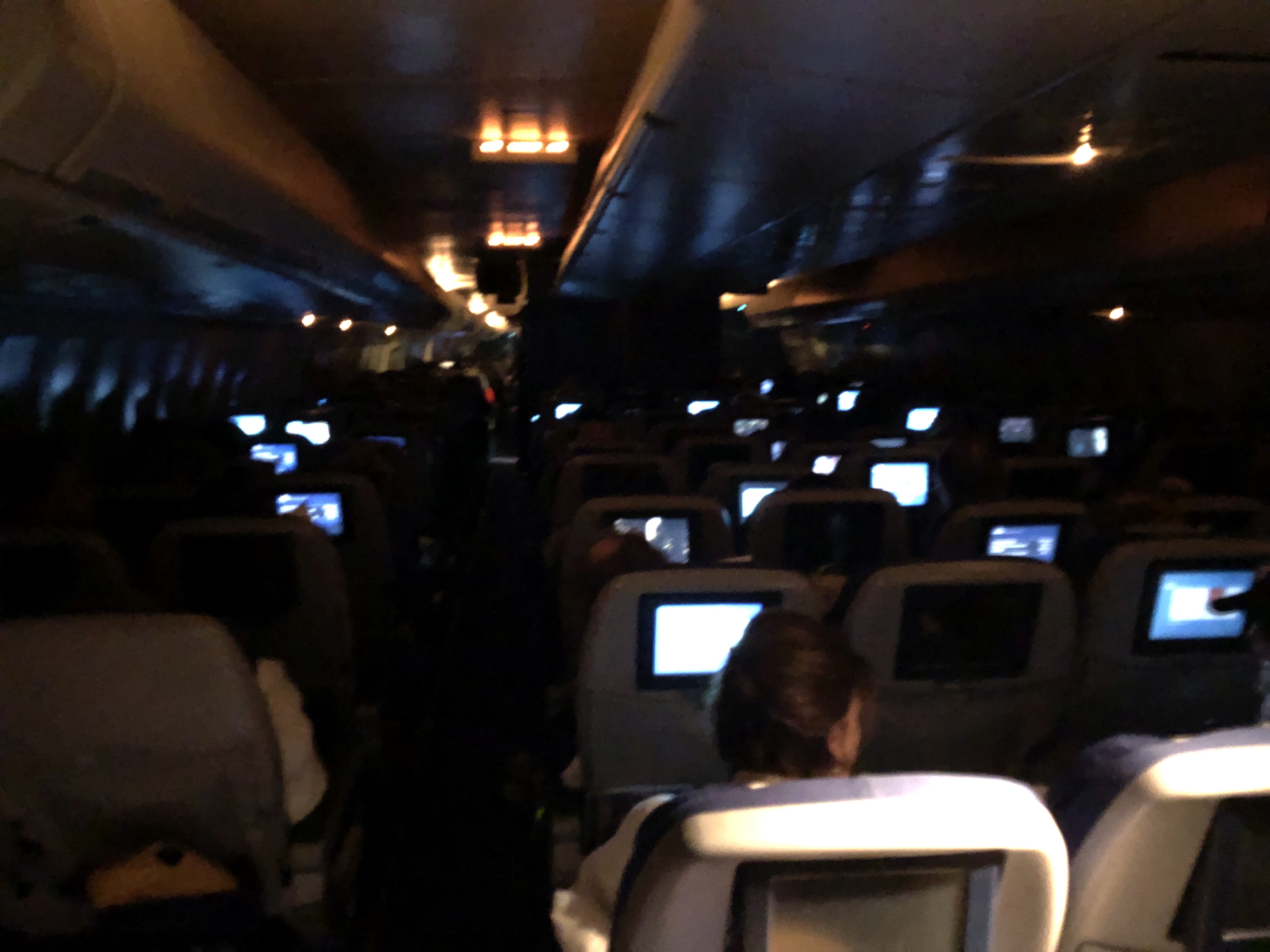 KLM 747 economy cabin at night sleeping