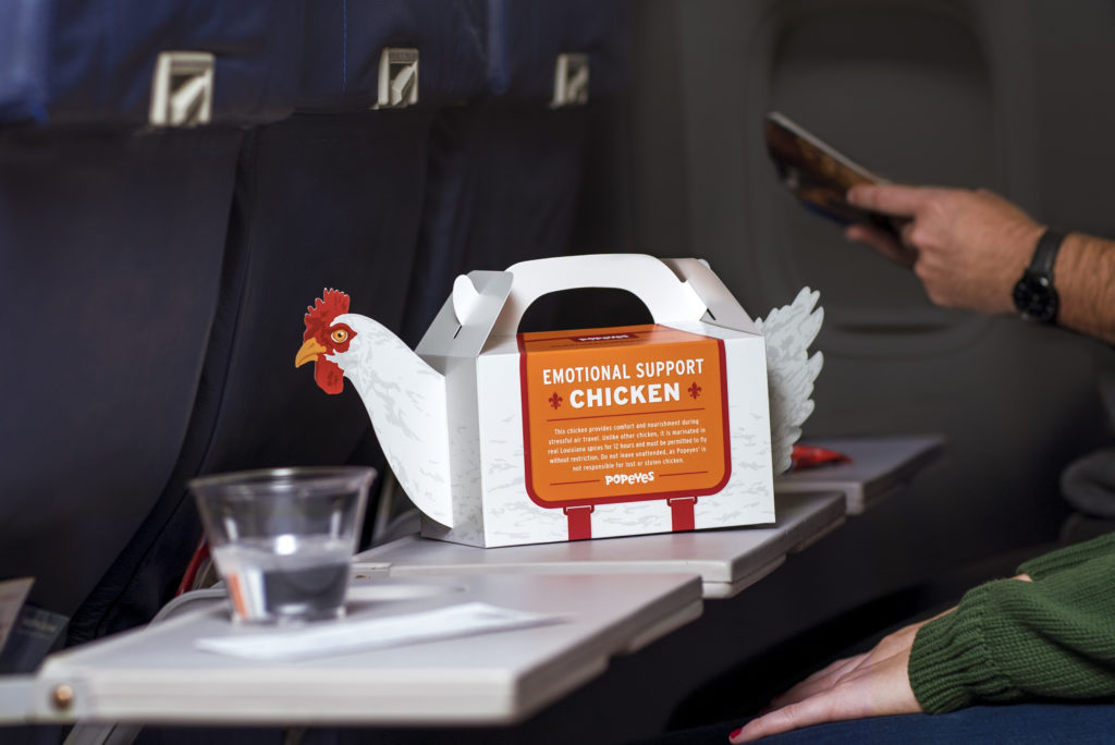 Popeyes is launching emotional support chicken to help passengers through stressful holiday travels. (Source: POPEYES)
