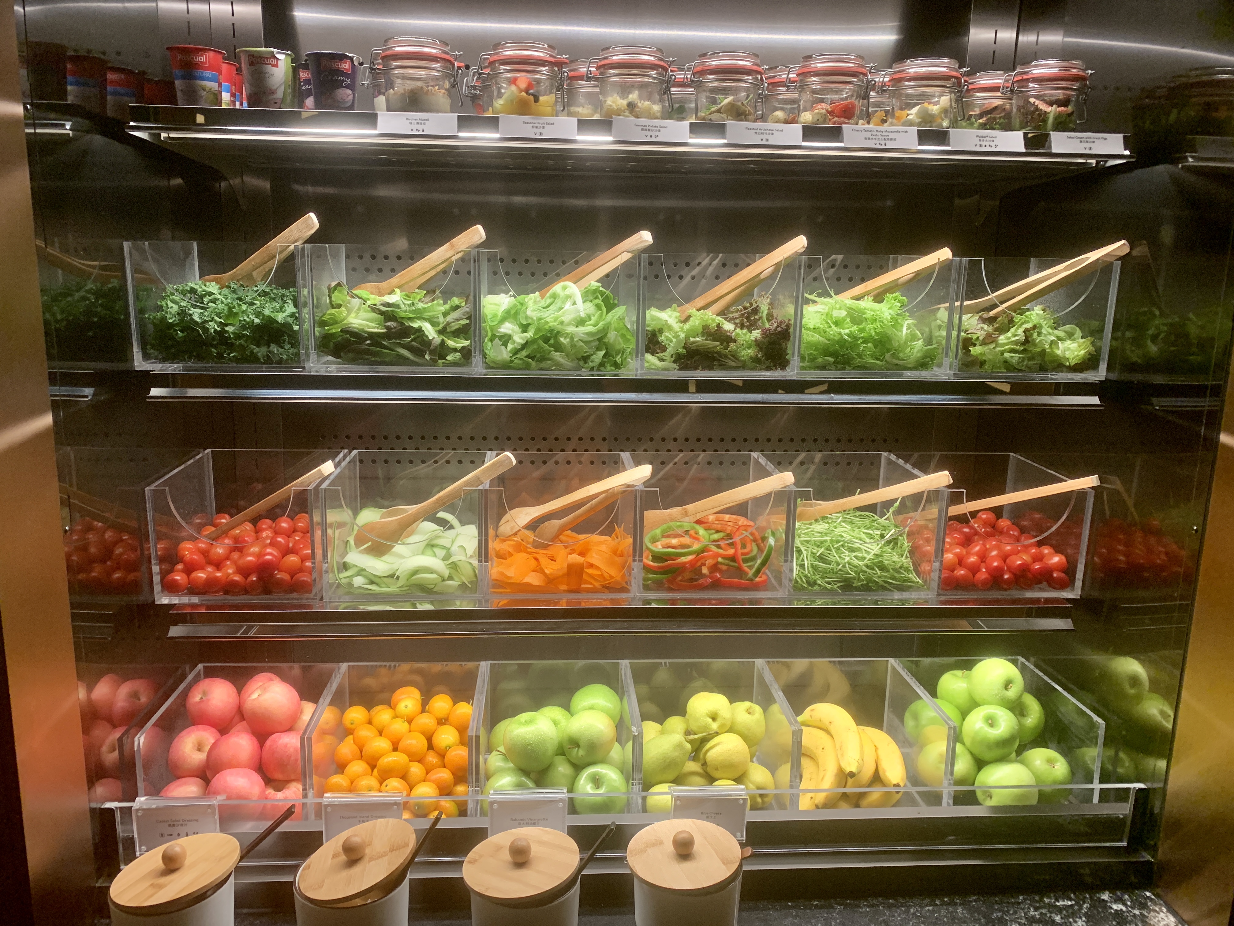 a display of vegetables and fruits